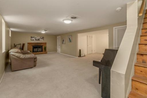 Lower level includes versatile family room and gas fireplace