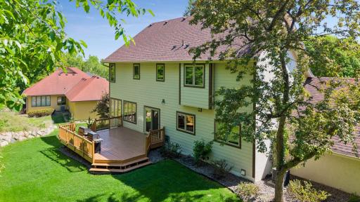 Drone photo from the north end of the homesite. Note how the spacious deck transitions easily to the private yard.