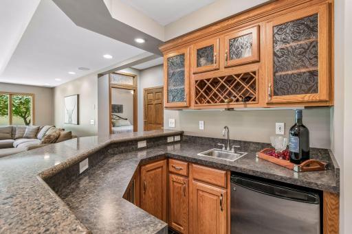Nice wet bar with beverage fridge and micro.