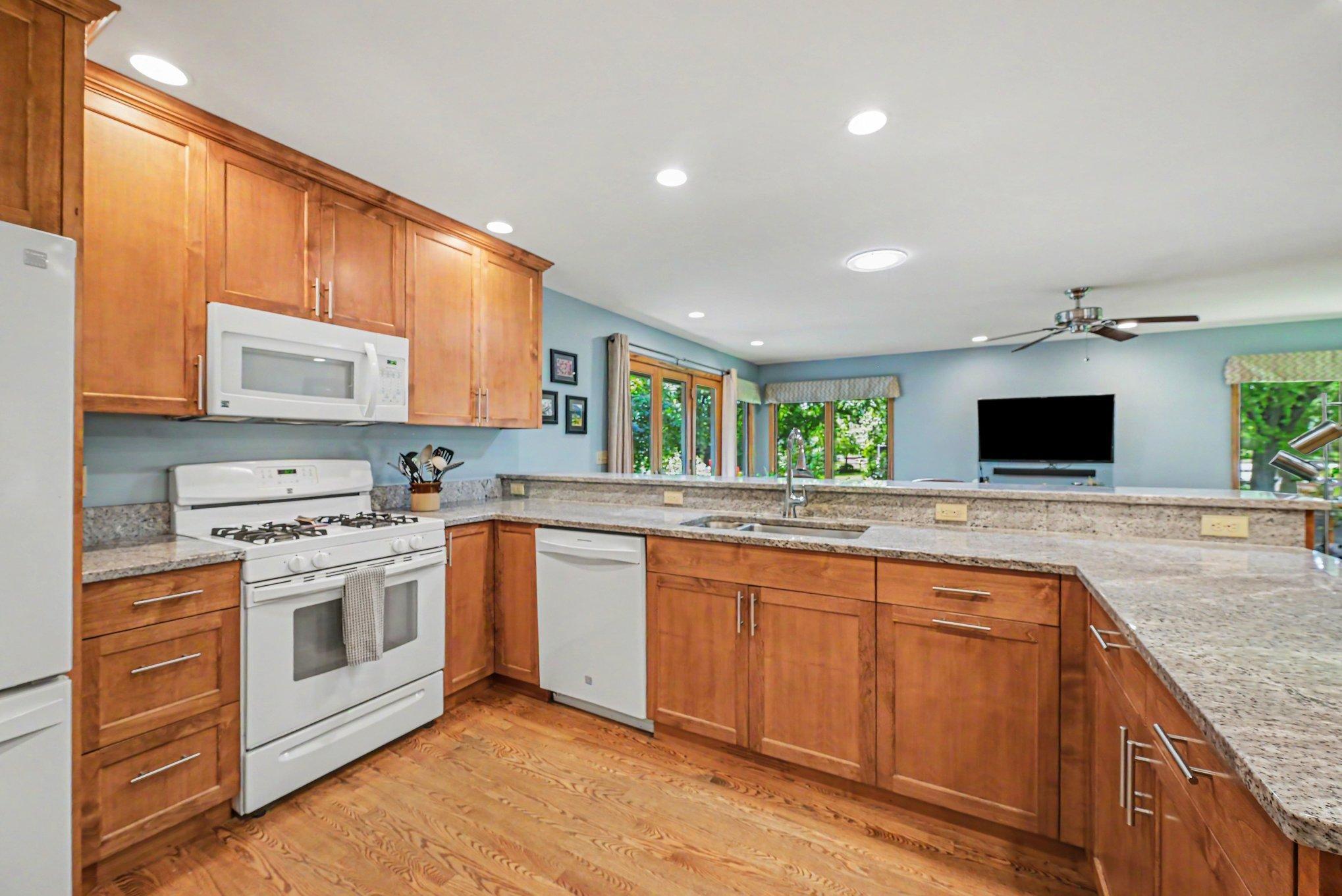 Large 10 x 11 chef's kitchen with gas stove. Loads of prep space overlooking the main floor family room.