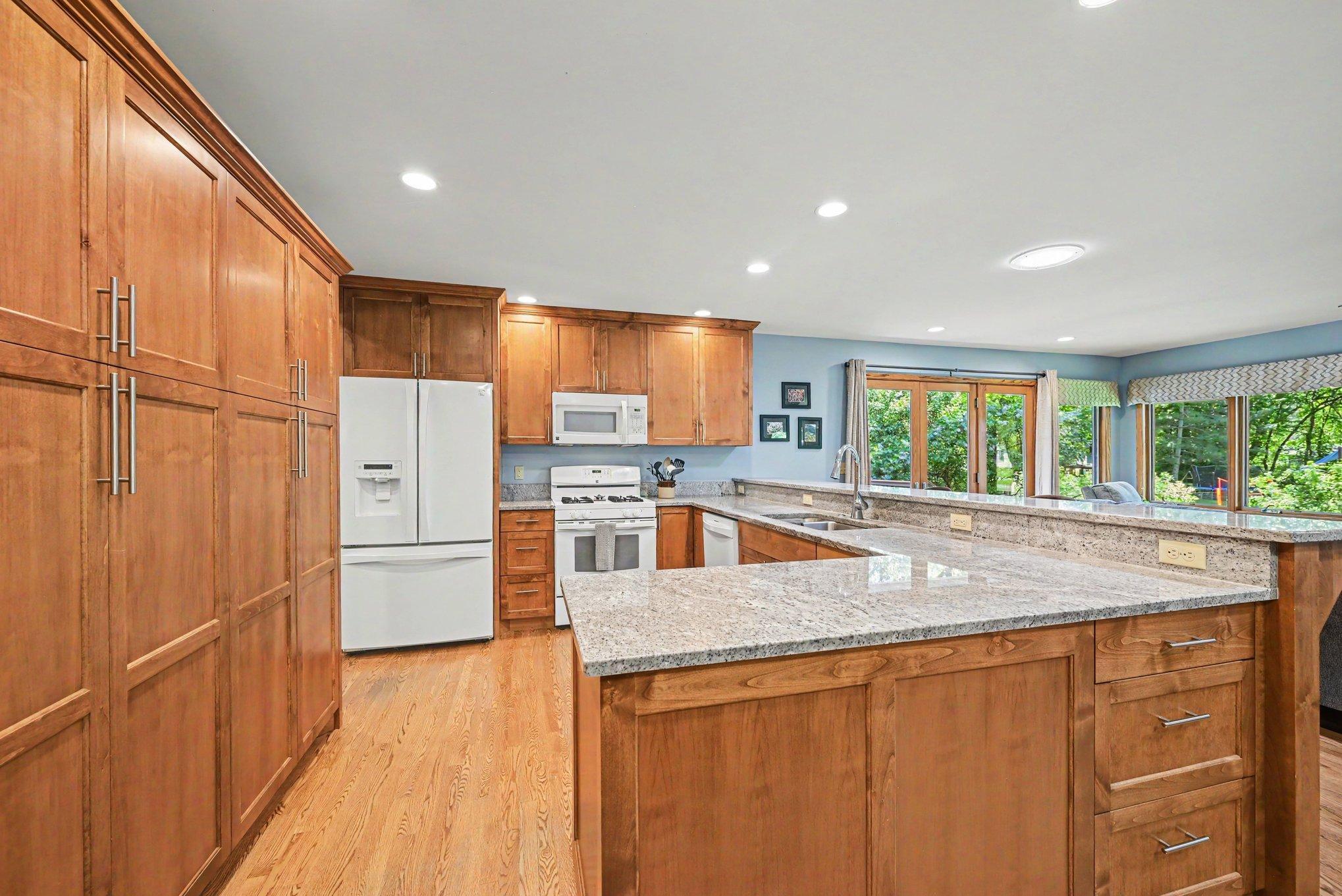 Beautiful, bright open concept space for entertaining.