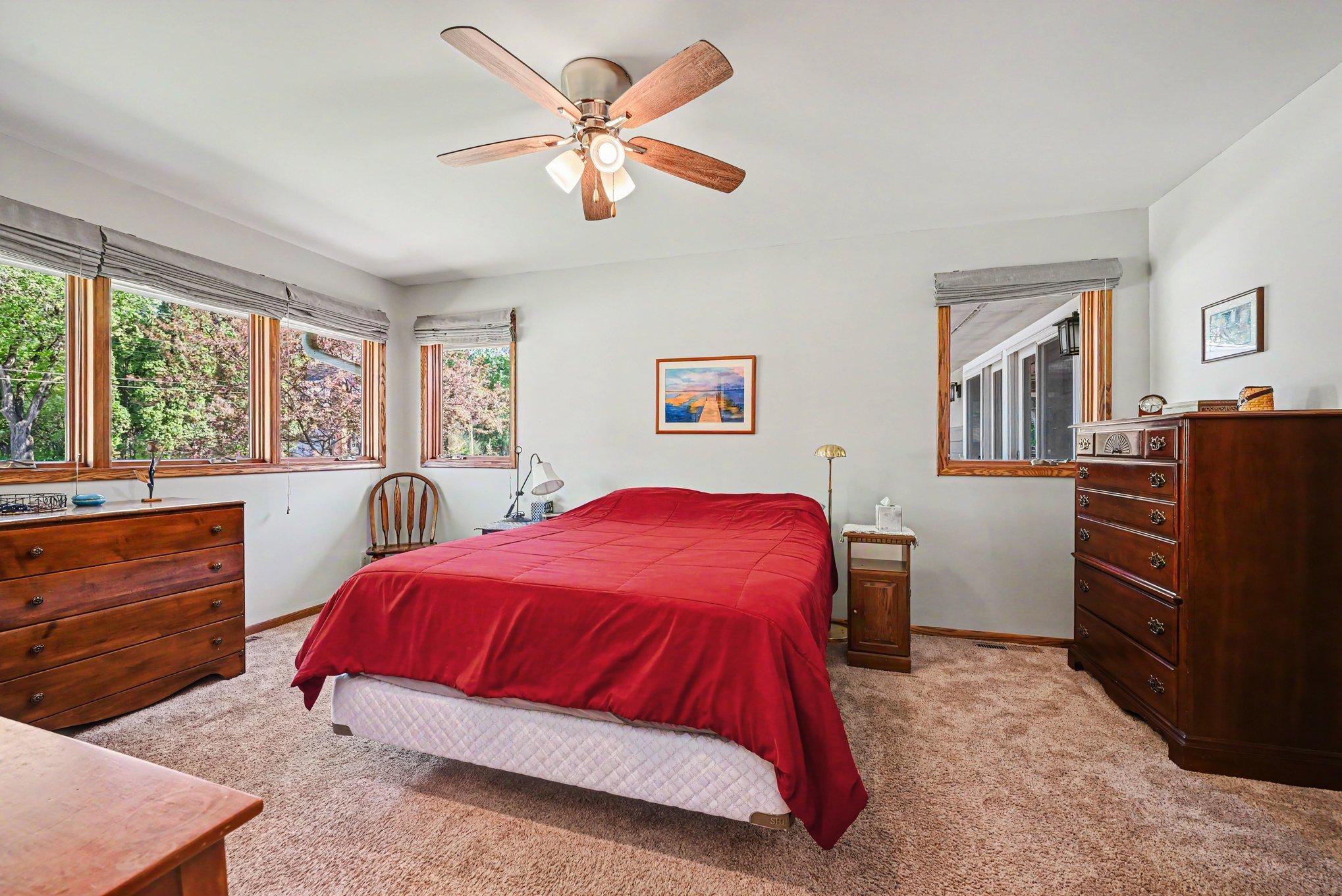 12 x 17 Primary Bedroom with walk in closet and 3/4 bathroom