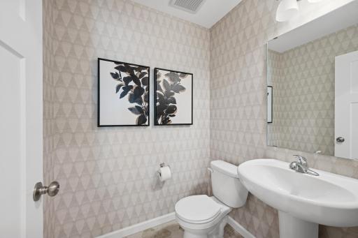 Main floor powder room- photo of a staged model home of the same floorplan