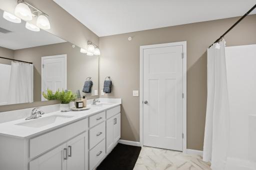 Primary bathroom- photo of a staged model home of the same floorplan