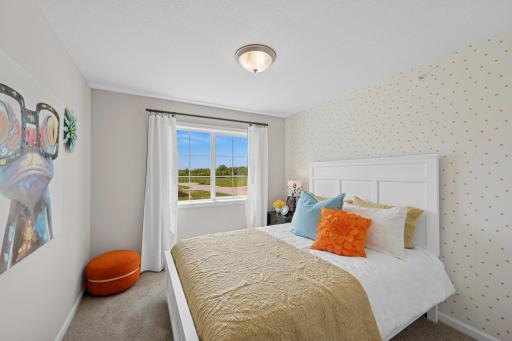 Bedroom - photo of a staged model home of the same floorplan