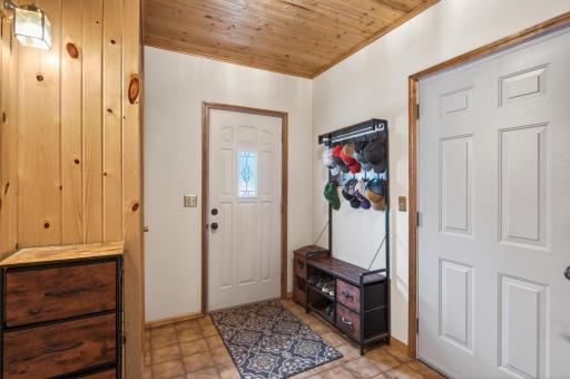 Nice size entry/mudroom with tiled floors.