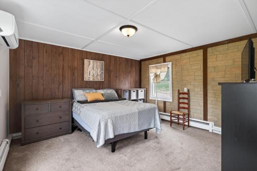 Roomy and bright main floor primary bedroom
