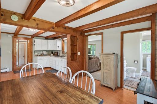 Kitchen and dining room with beautiful wood beams.