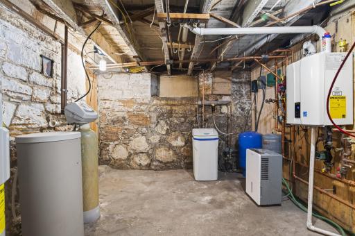 Lot of room in the utility/storage room. Nice tankless boiler for the hot water.