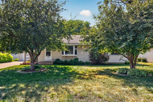 Great location boosting mature trees, landscaping & more!