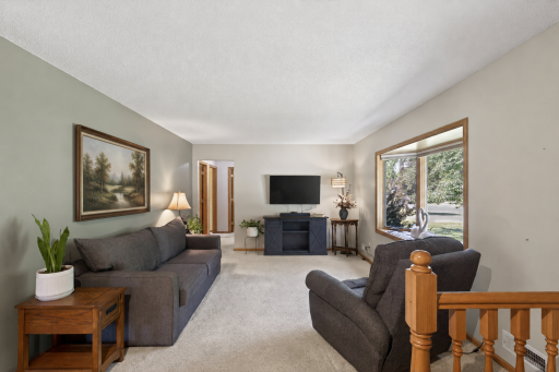 Spacious bay window fills the home with natural light