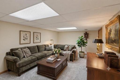 The lower features a large family room-Virtually staged