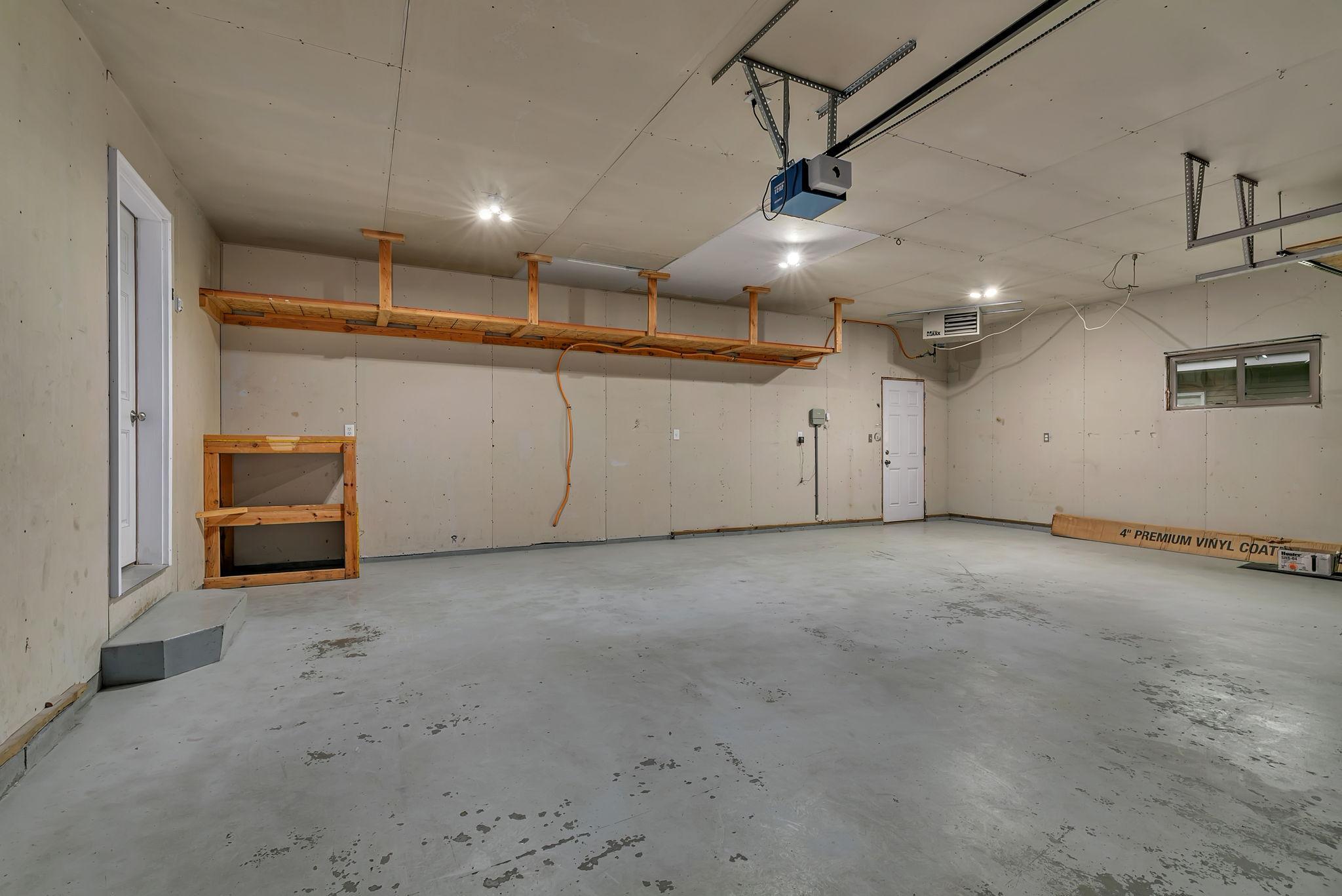 3 stall garage is insulated & heated. 29'x23'