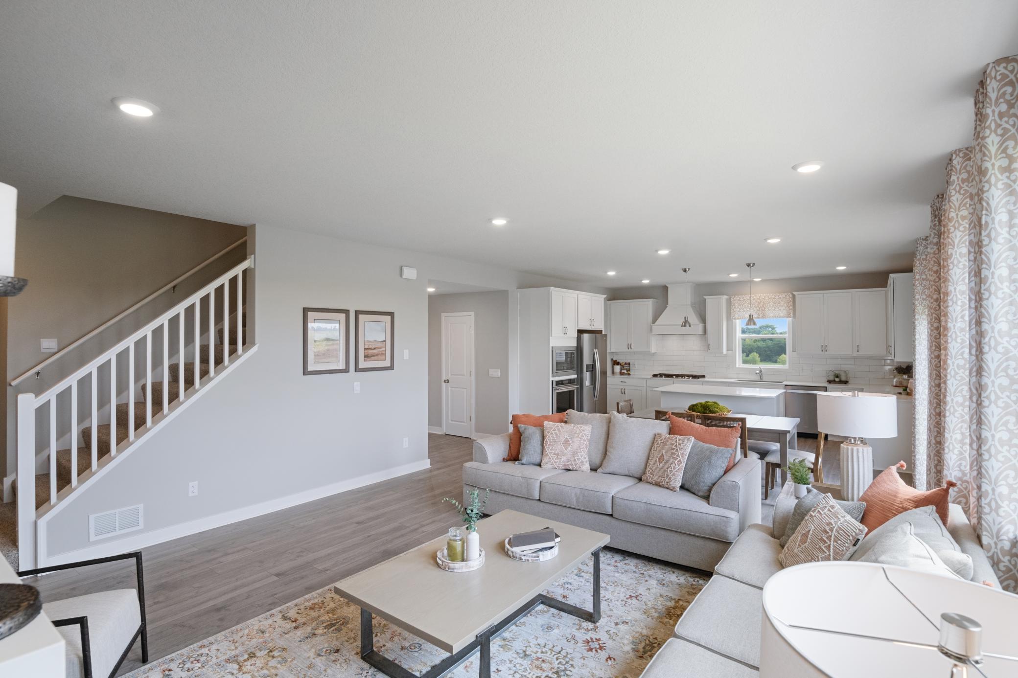Family room view. Photo of prior model home, colors and finishes will vary.