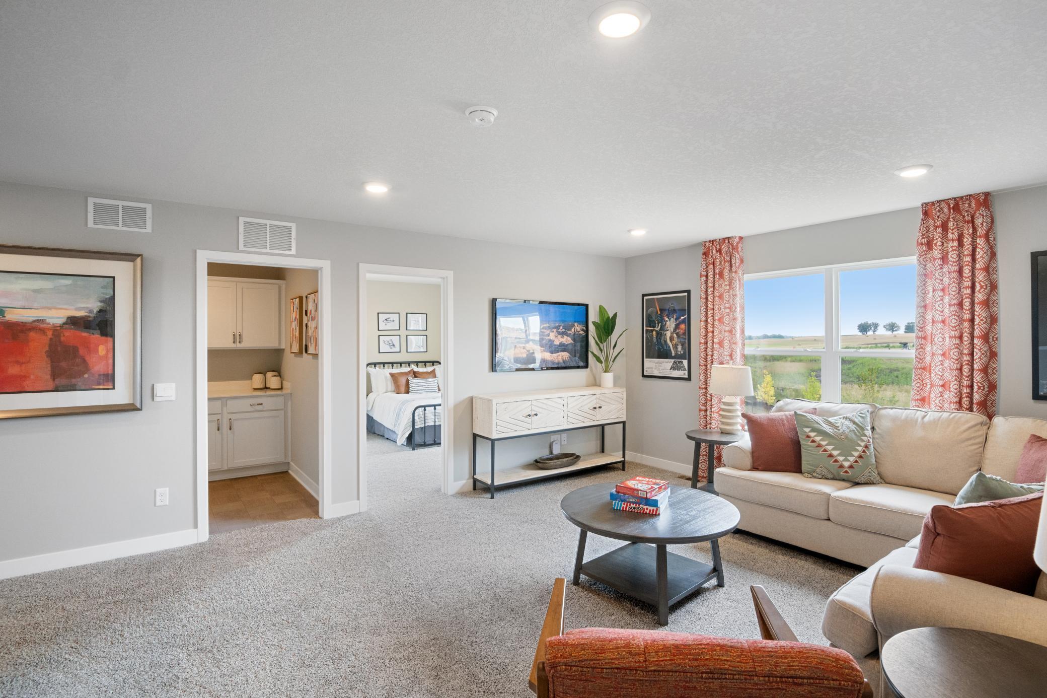 Loft on upper level, another view. Photo of prior model home, colors and finishes will vary.