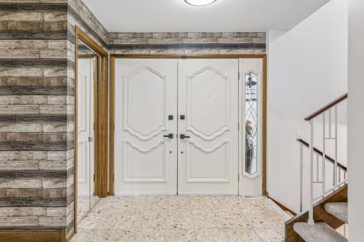 The foyer has a double door entry with a convenient coat closet.