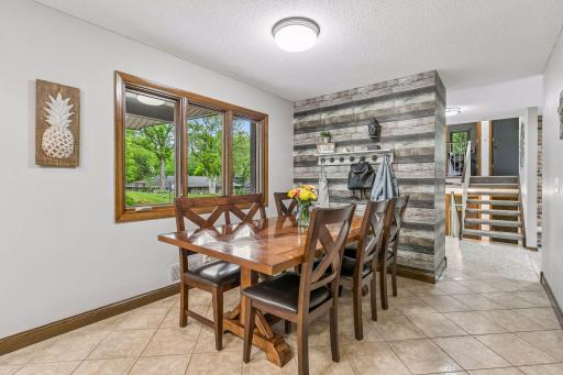 Ceramic tile floors continue into the informal dining space.