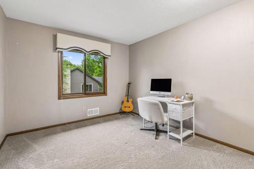 This is the second bedroom on the upper level. New carpet continues throughout this level.