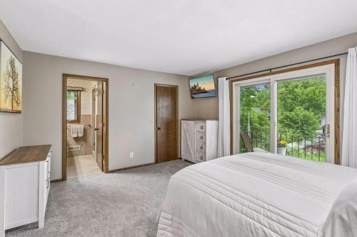 The suite includes a walk-in closet and private three-quarter bath.