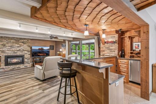 The bar has quartz counters and lots of storage as well as an icemaker.