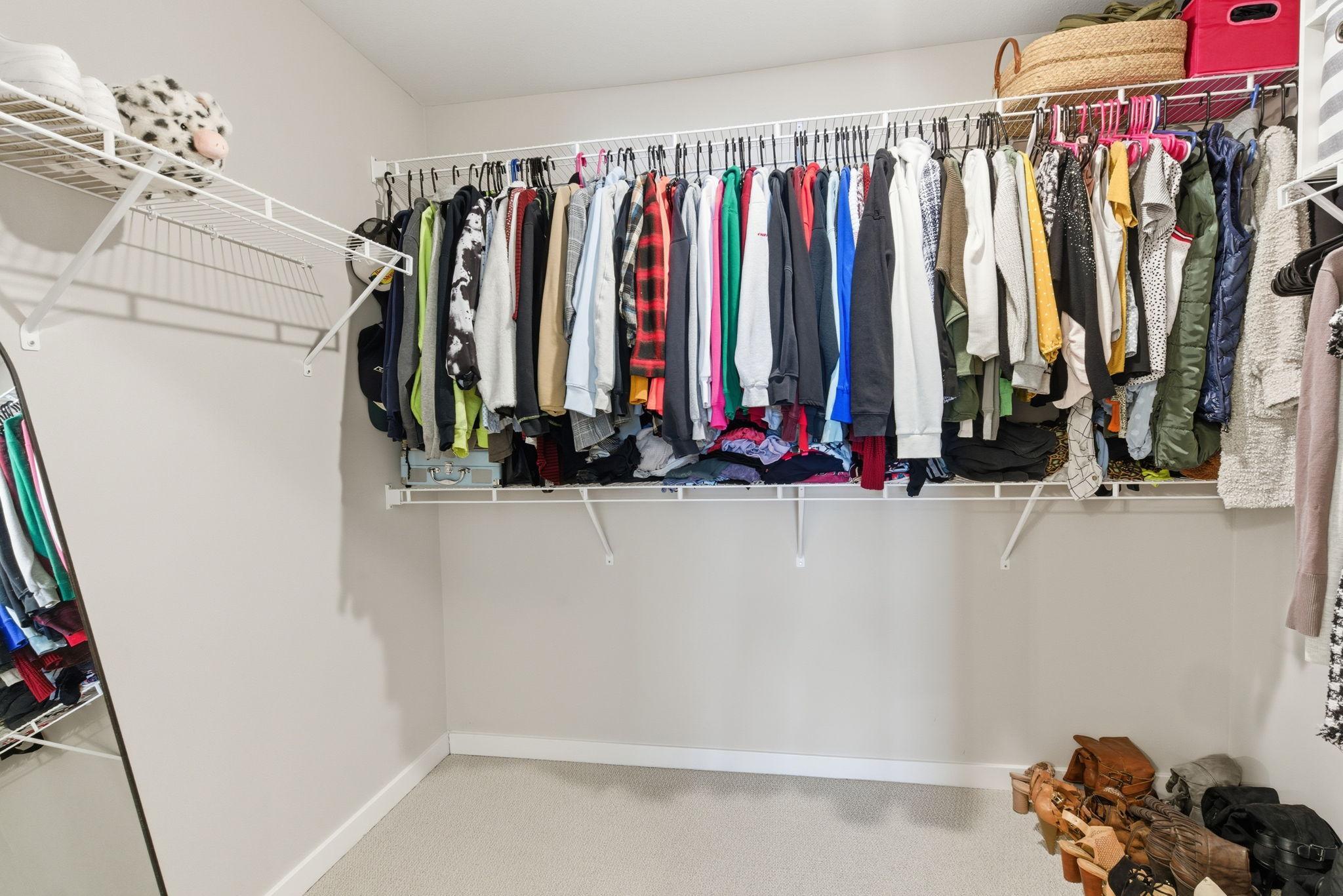 The expansive walk-in closet is move-in ready while also offering a blank slate for future customization—perfect for adding built-ins or designer touches to suit your personal style and storage needs.