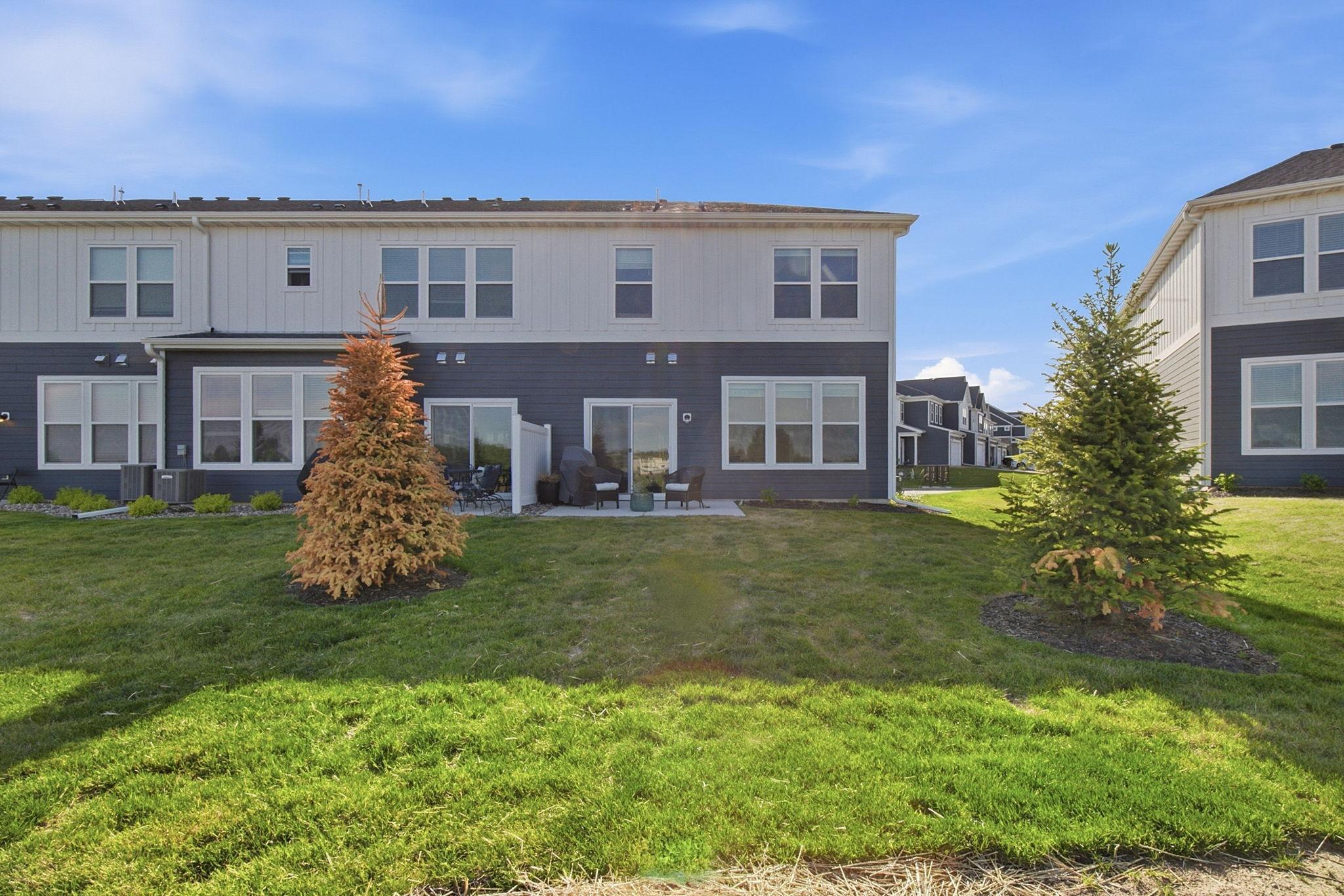 Large windows bring in abundant natural light and create a seamless connection between indoor and outdoor living. The modern exterior design is both stylish and durable, offering peace of mind and curb appeal from every angle.