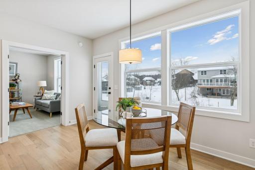 The informal dining room is just steps away from the kitchen. (Photo of a previously built Summit Floorplan)