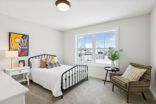There are three additional bedrooms on the upper level as well as one on the lower level. (Photo of a previously built Summit Floorplan)