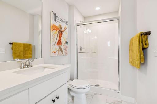 Jack-n-Jill bath on upper level. (Photo of a previously built Summit Floorplan)