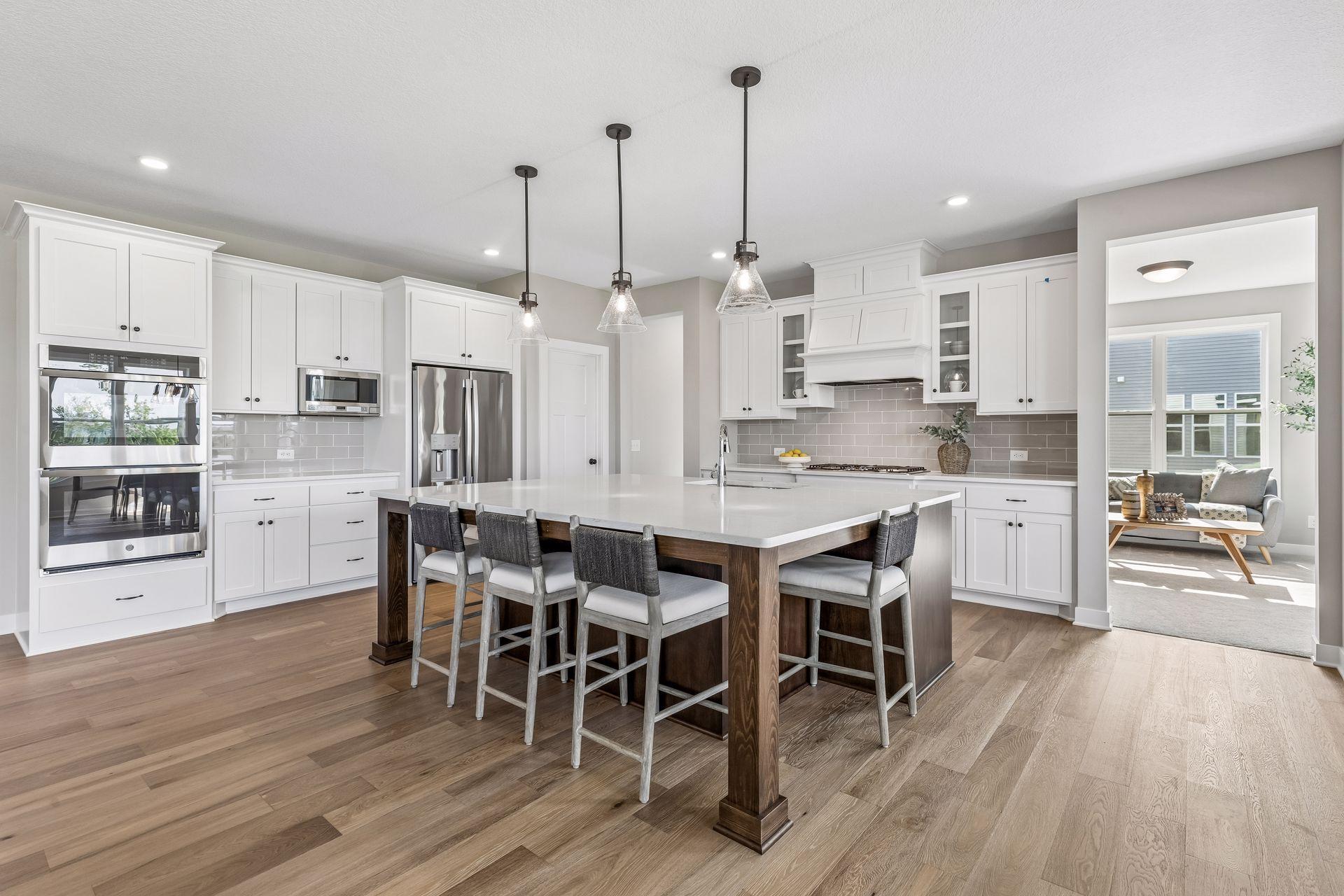 All our features are standard including the granite countertops, tile backsplash and under mount kitchen sinks. (Photo of a previously built Telluride Floorplan)