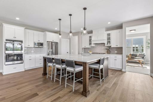 All our features are standard including the granite countertops, tile backsplash and under mount kitchen sinks. (Photo of a previously built Telluride Floorplan)