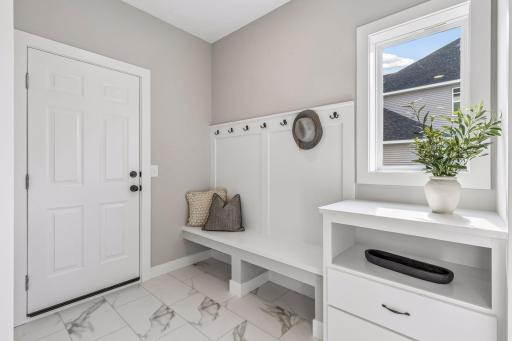 The spacious mud room helps your home stay organized. (Photo of a previously built Telluride Floorplan)