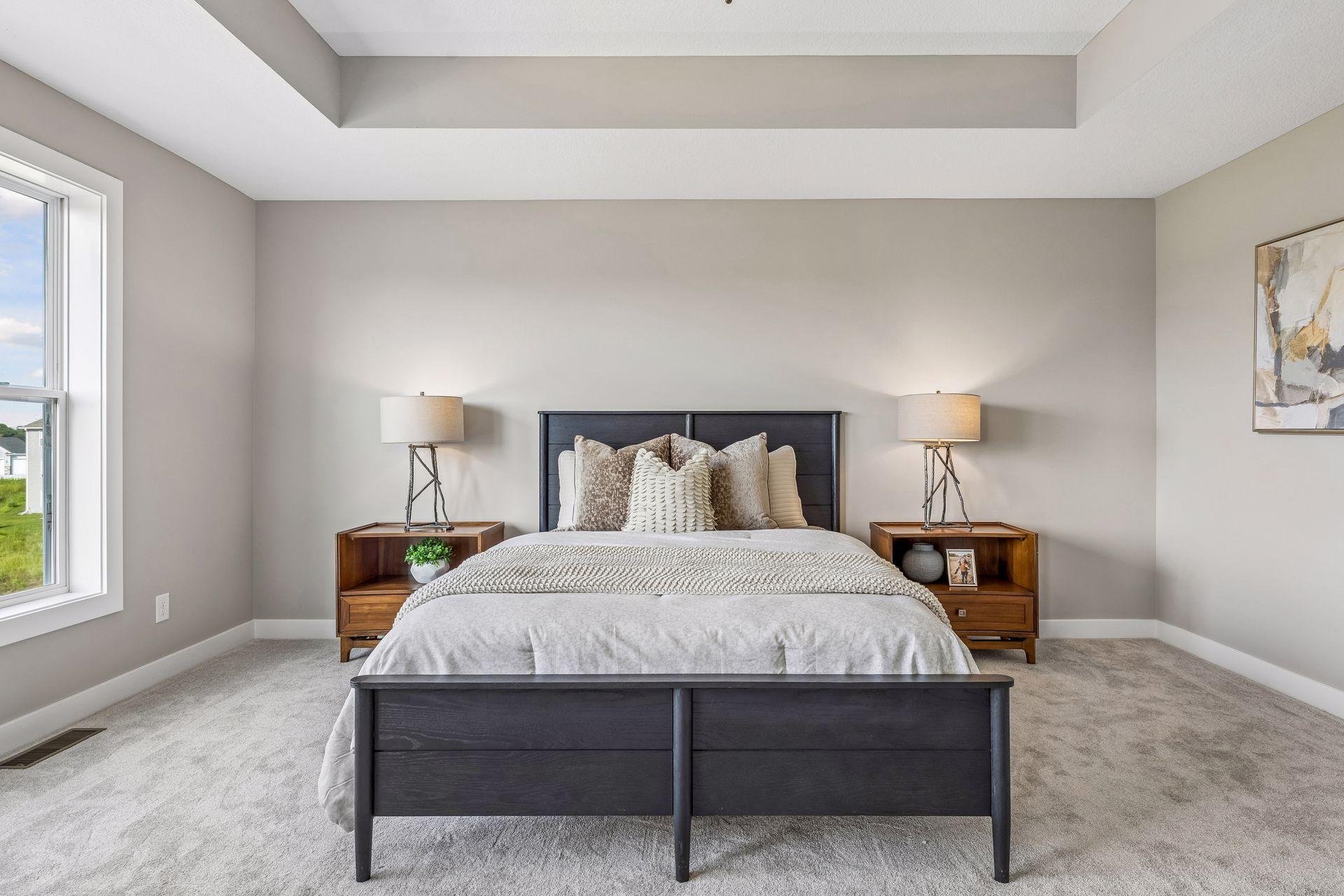 Open the grand French doors into your very own owner's suite with a private bath. (Photo of a previously built Telluride Floorplan)