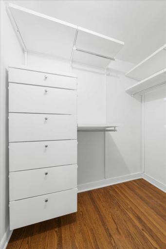 Walk in closet phone to the right of the main door leading into the primary bedroom