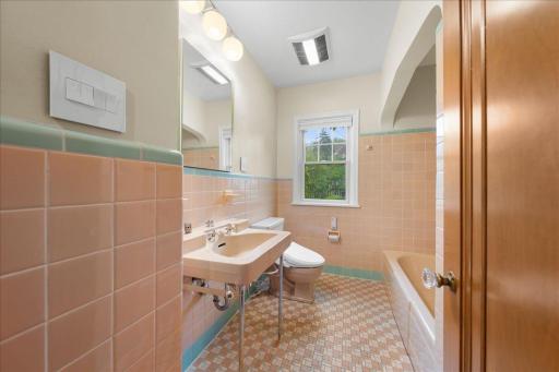 Main Floor vintage (Retro) Full Bath with original tile!