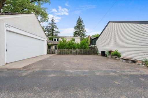 View of 2 Car Garage and driveway space off of the Alley Way
