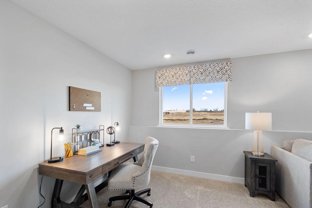 Lower level family room. Photo is of actual home. Colors and options may vary. Ask Sales Agent for details.