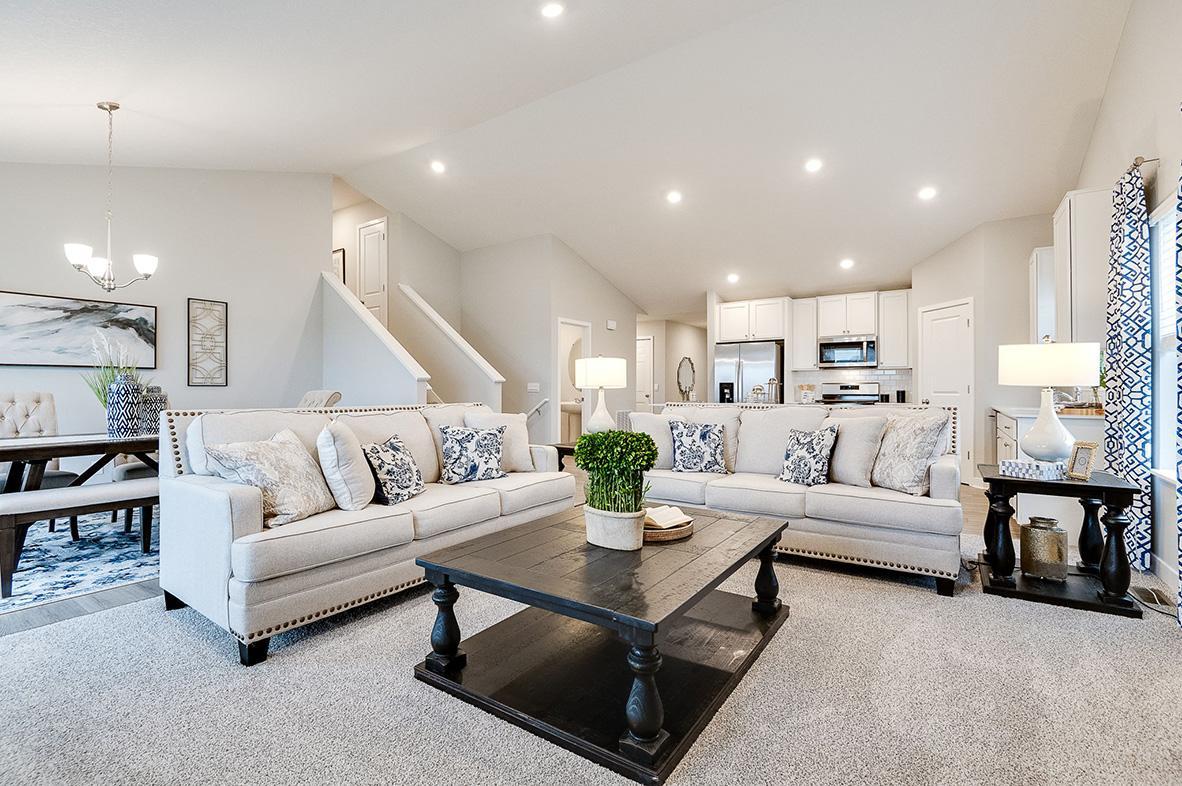 This massive cathedral vault hovers over the entire main level, equating in an openness rarely matched in new home design. Photo of model, colors and options will vary.