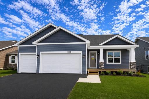 The Cameron II Northern Craftsman at Highlands at Eagle View in Elko New Market. Photo is of a actual home with AI-generated parts for visualization. Options and colors may vary. Ask Sales Agent for details. Actual yard condition may differ.