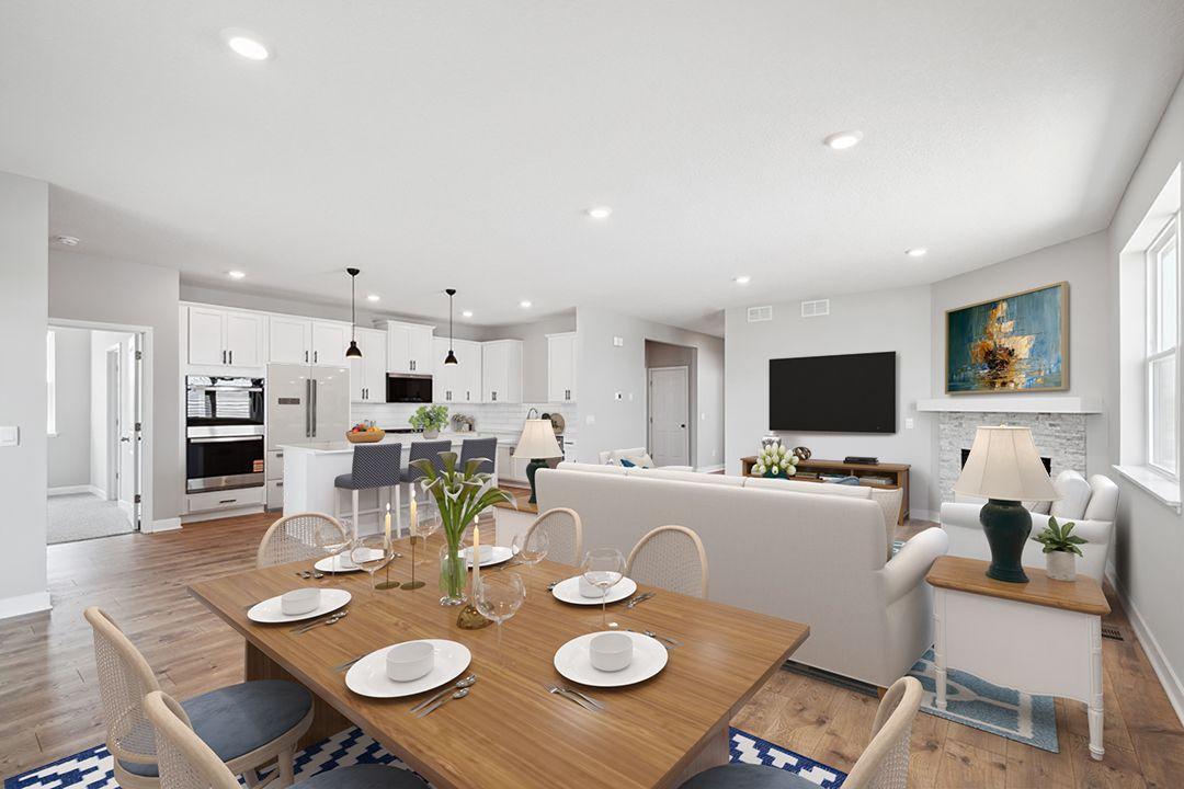Open main level with laminate flooring throughout provides a great space for any type of gatherings. *Picture is of actual home.