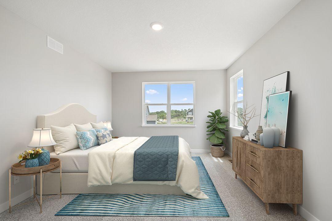 Primary bedroom suite with ensuite bathroom and DUAL walk-in closets provide a pleasant escape the rest of the home. *Picture is of model home. Actual finishes may vary.