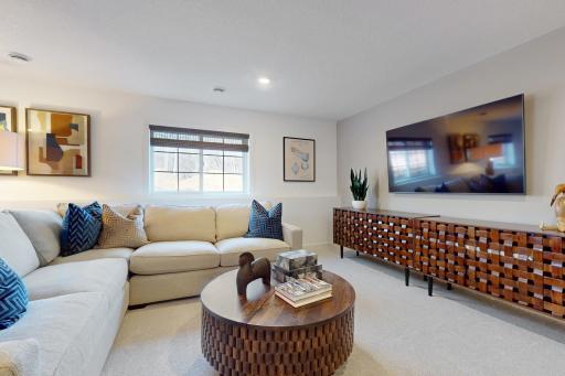 (Photo of a decorated model, actual home's finishes will vary slightly)