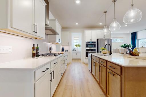 (Photo of a decorated model, actual home's finishes will vary slightly)
