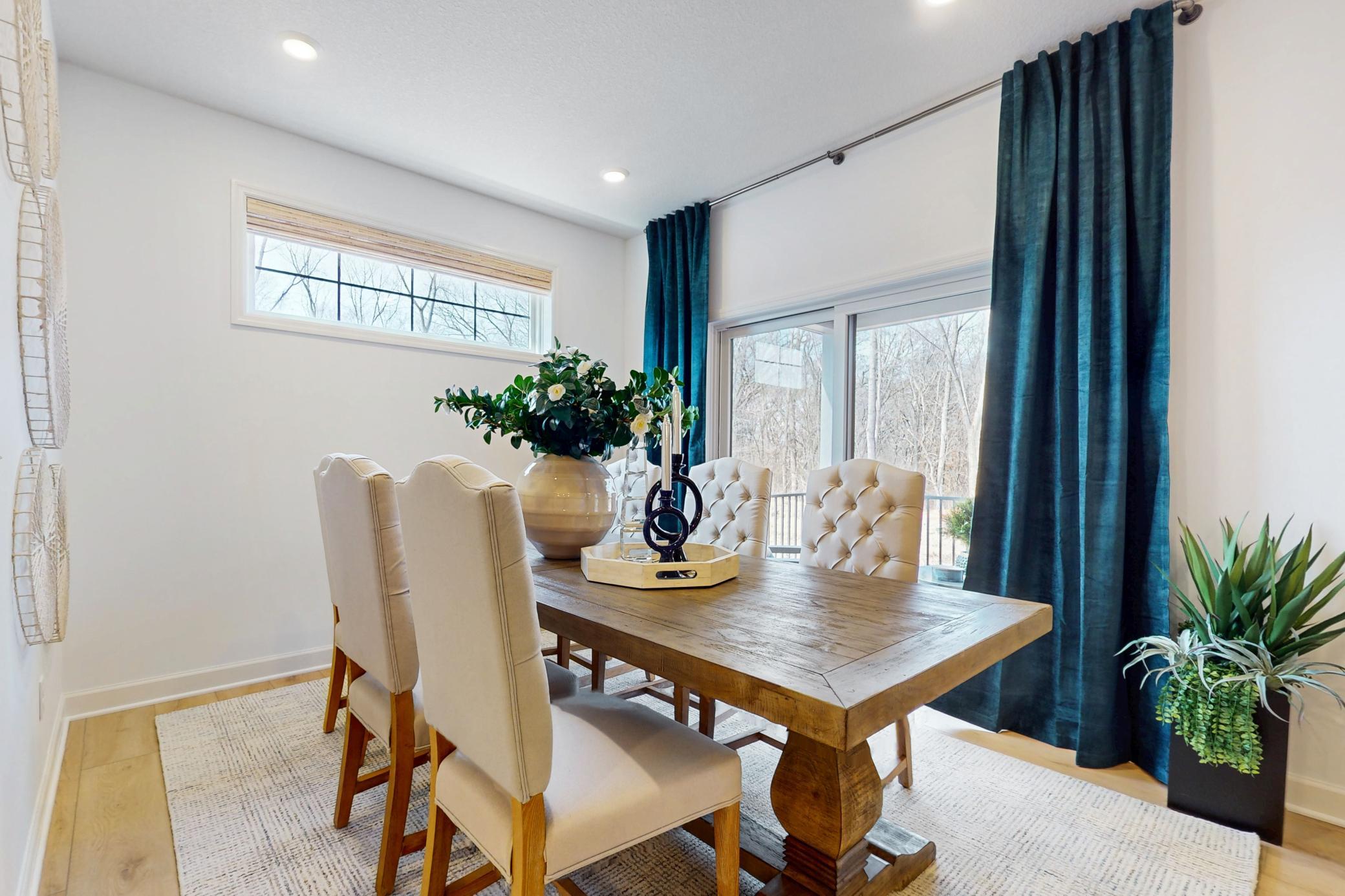 (Photo of a decorated model, actual home's finishes will vary slightly)