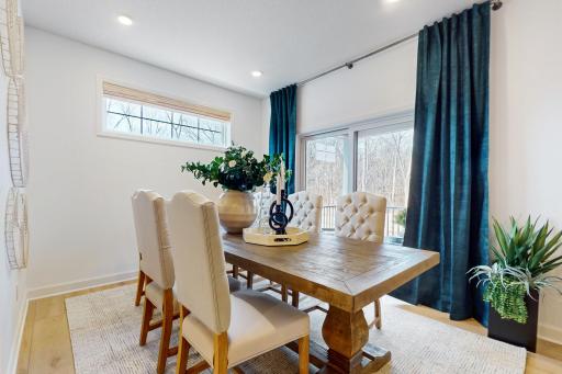 (Photo of a decorated model, actual home's finishes will vary slightly)