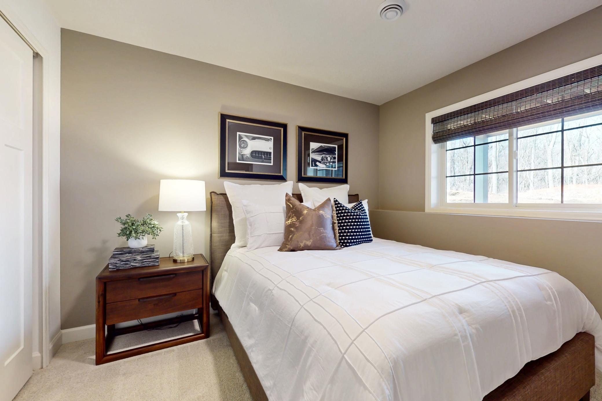 (Photo of a decorated model, actual home's finishes will vary slightly)