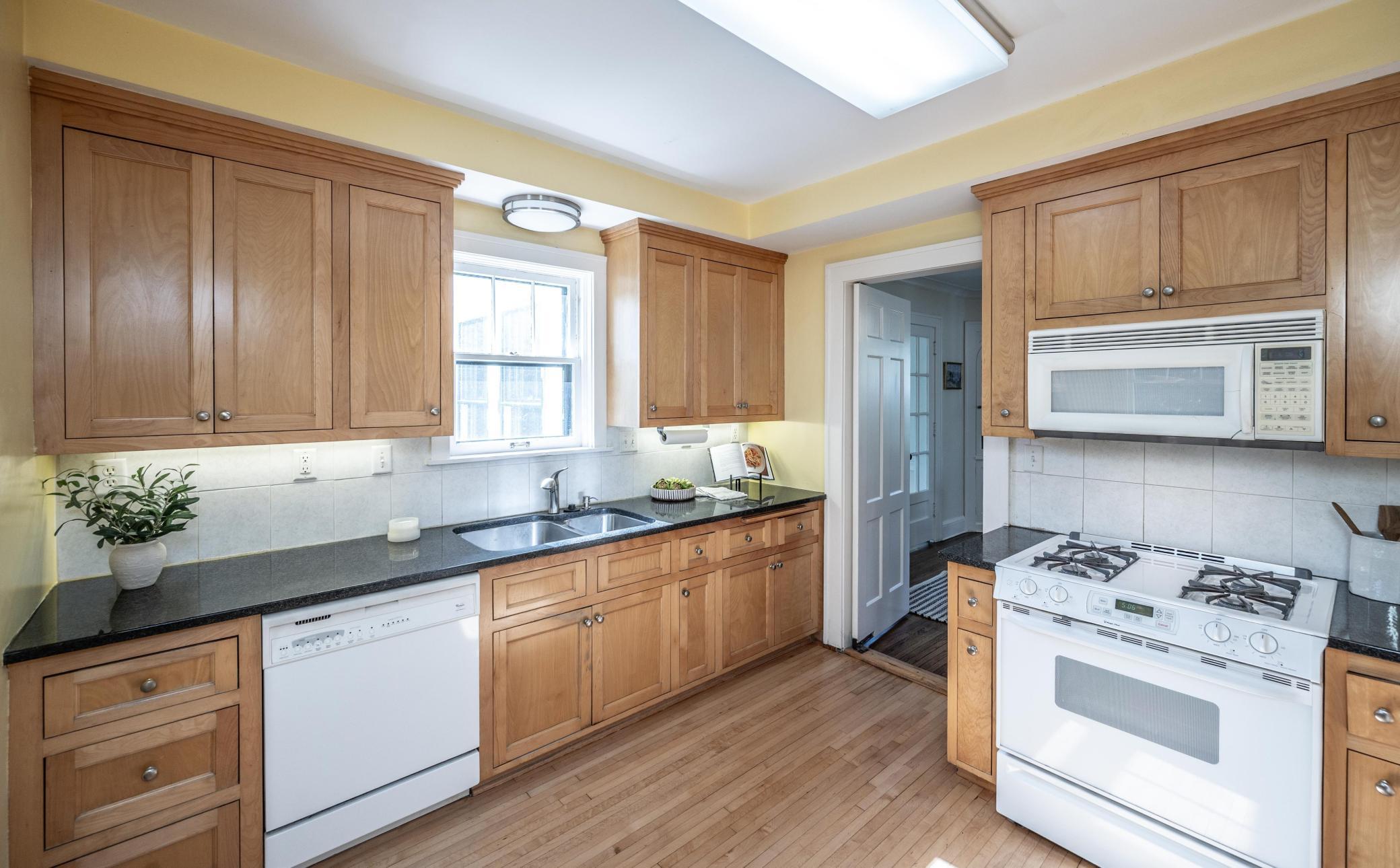 Solid surface counters, custom cabinets