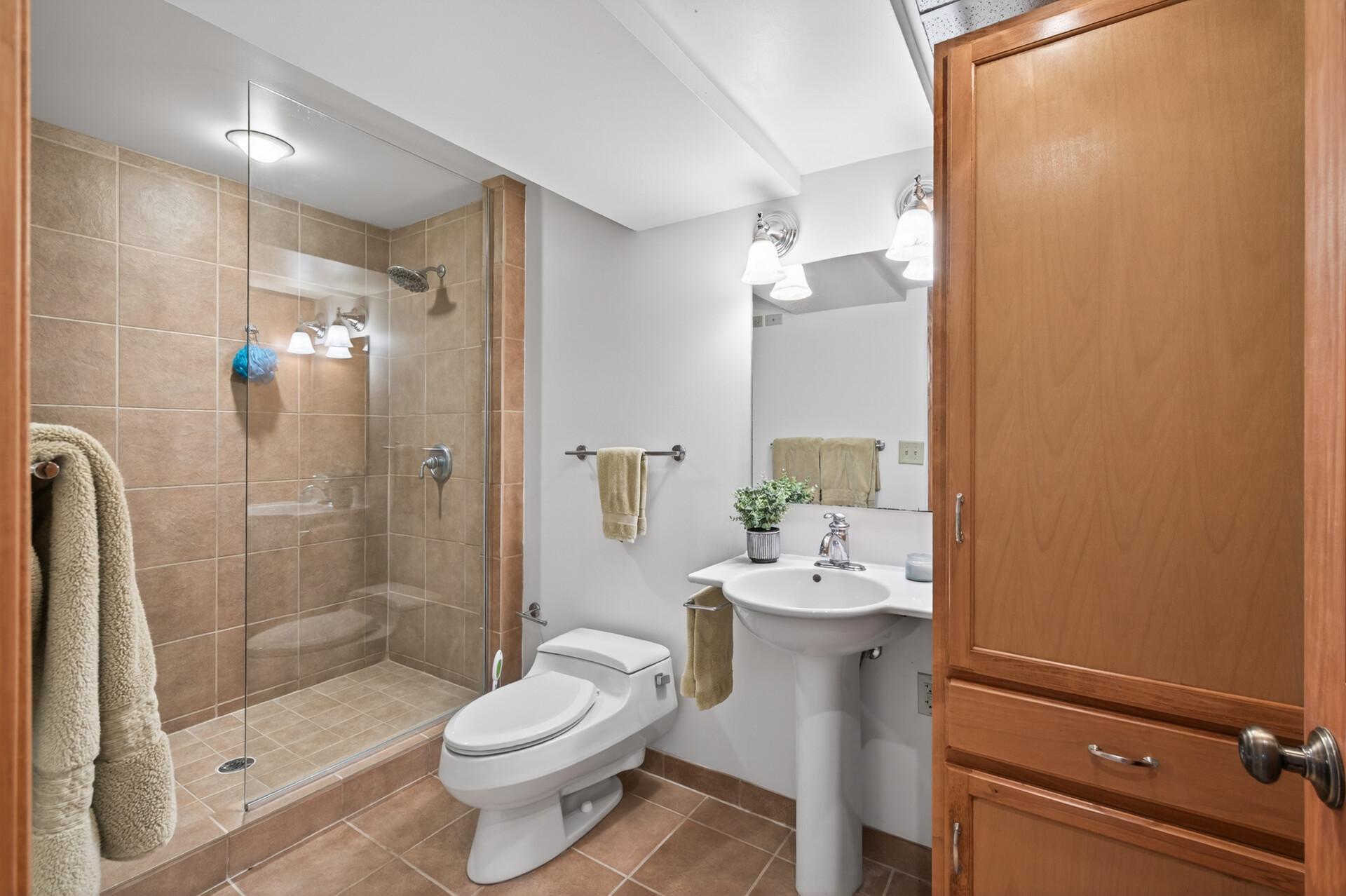 Charming 3/4 bath on lower level.
