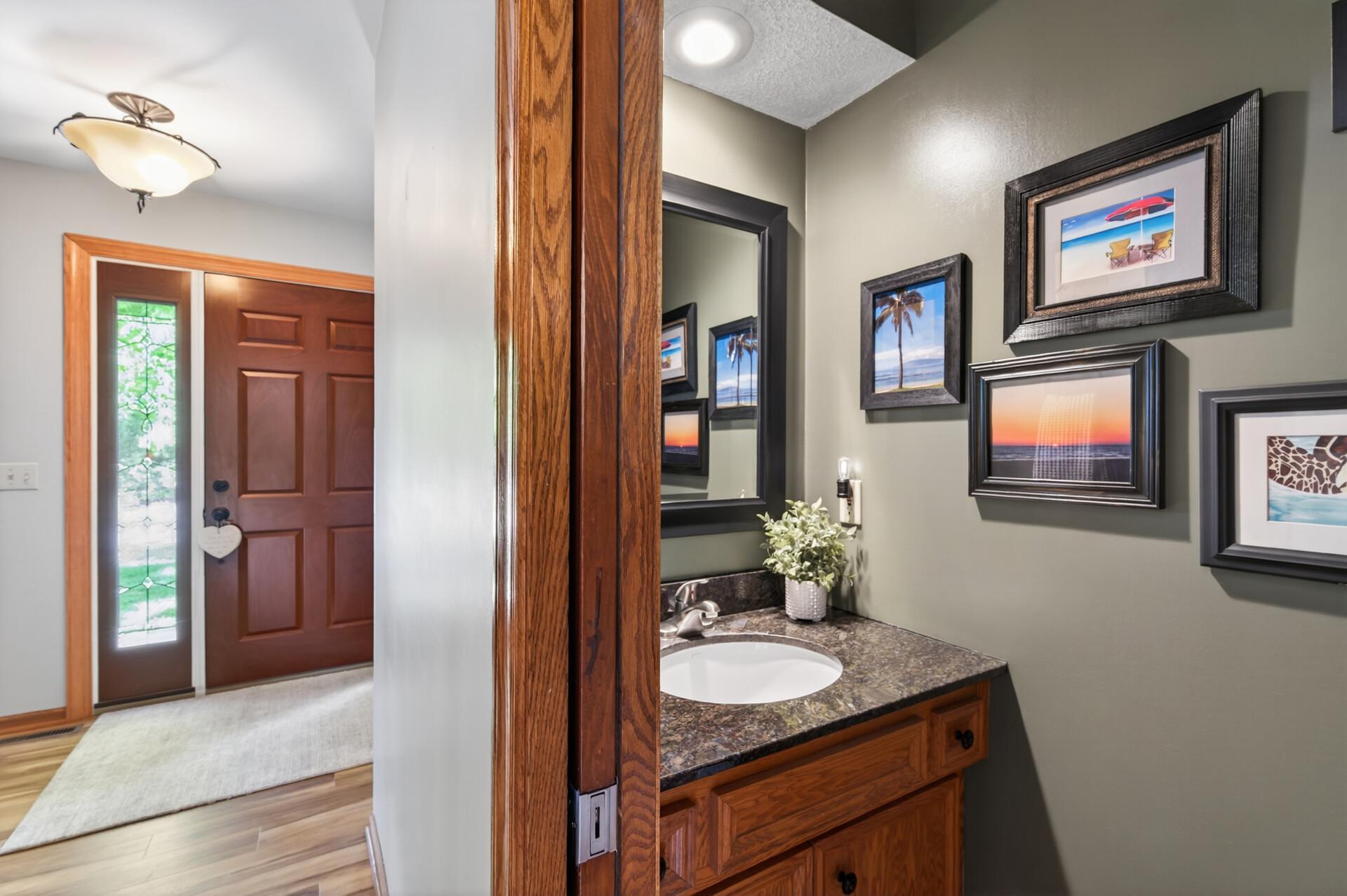 Main floor powder bath couldn't be more convenient to everything the main floor offers