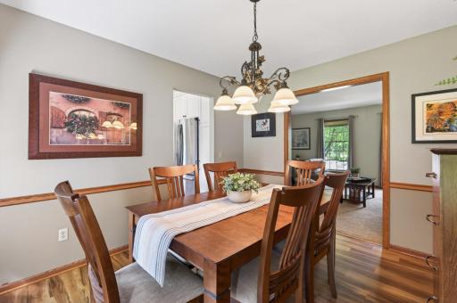 Formal dining room is convenient to both the living room and kitchen